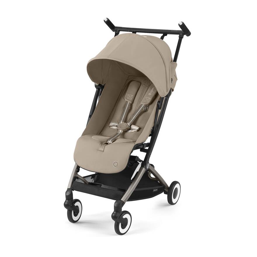 A beige compact stroller (Cybex Libelle)